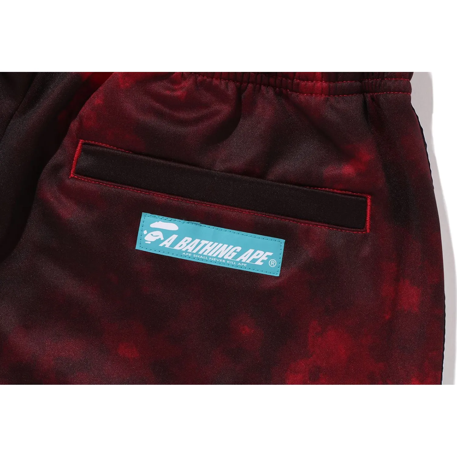 A BATHING APE TIE DYE TRACK PANTS MENS