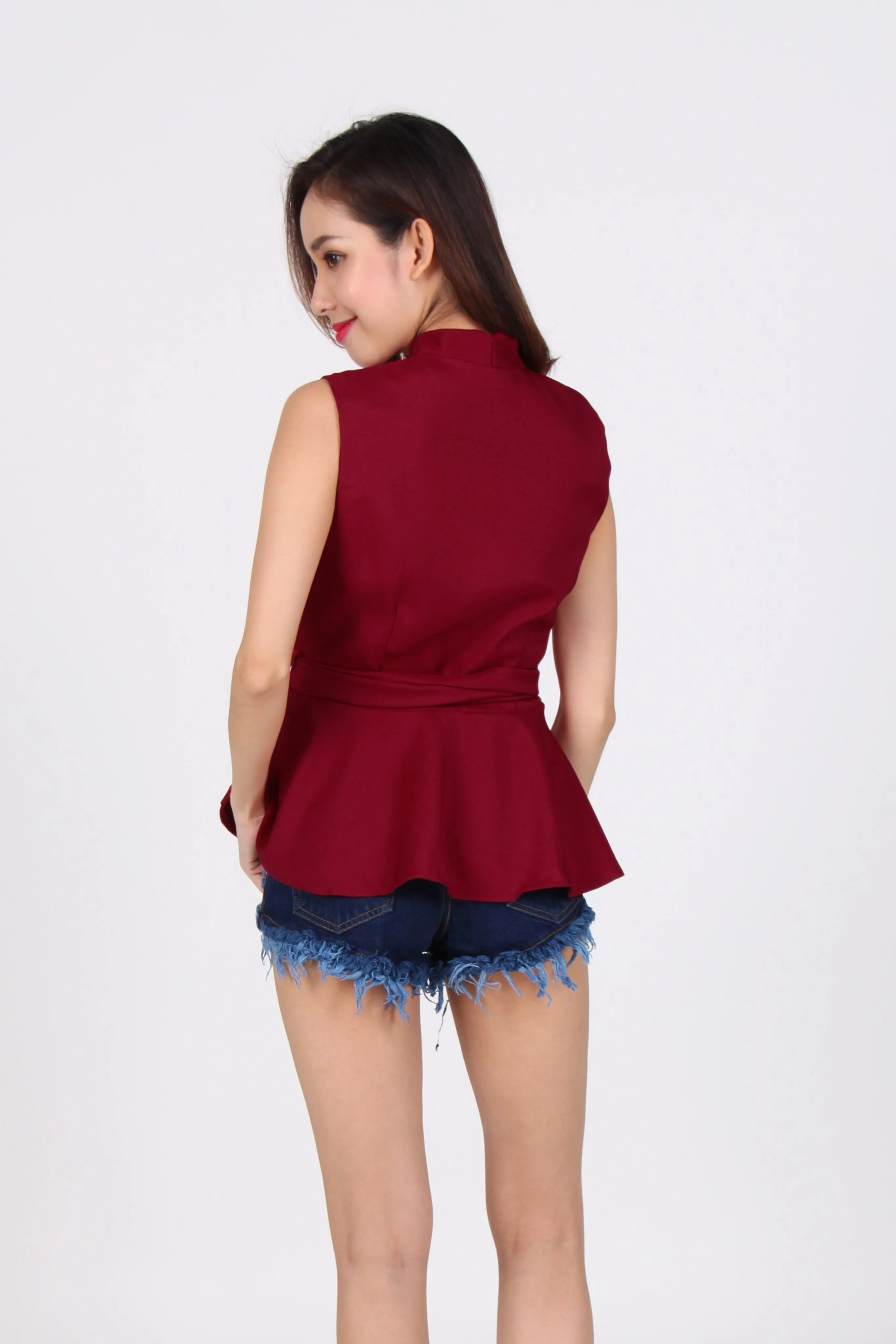 Wrap Peplum Top In Maroon