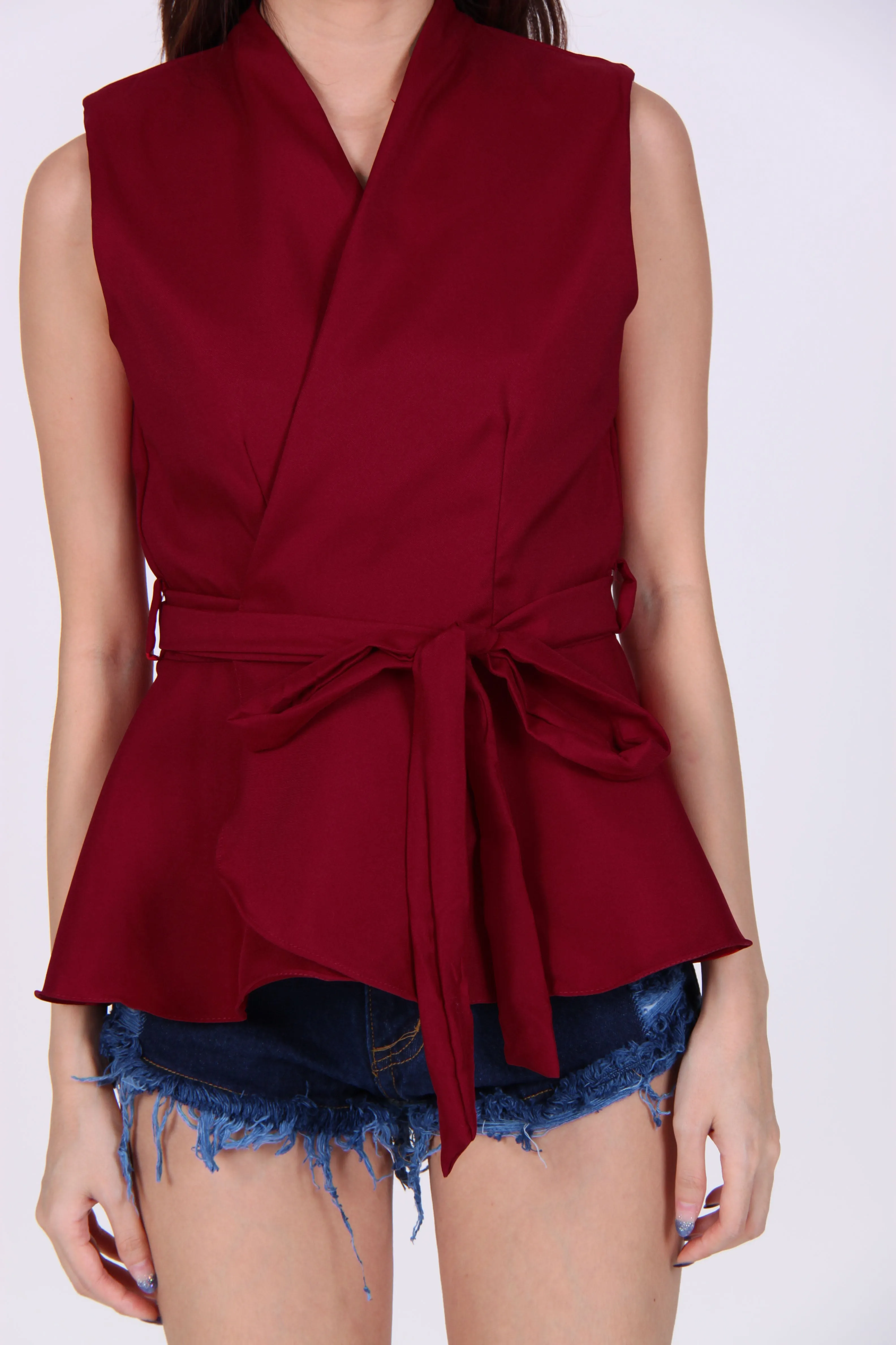 Wrap Peplum Top In Maroon